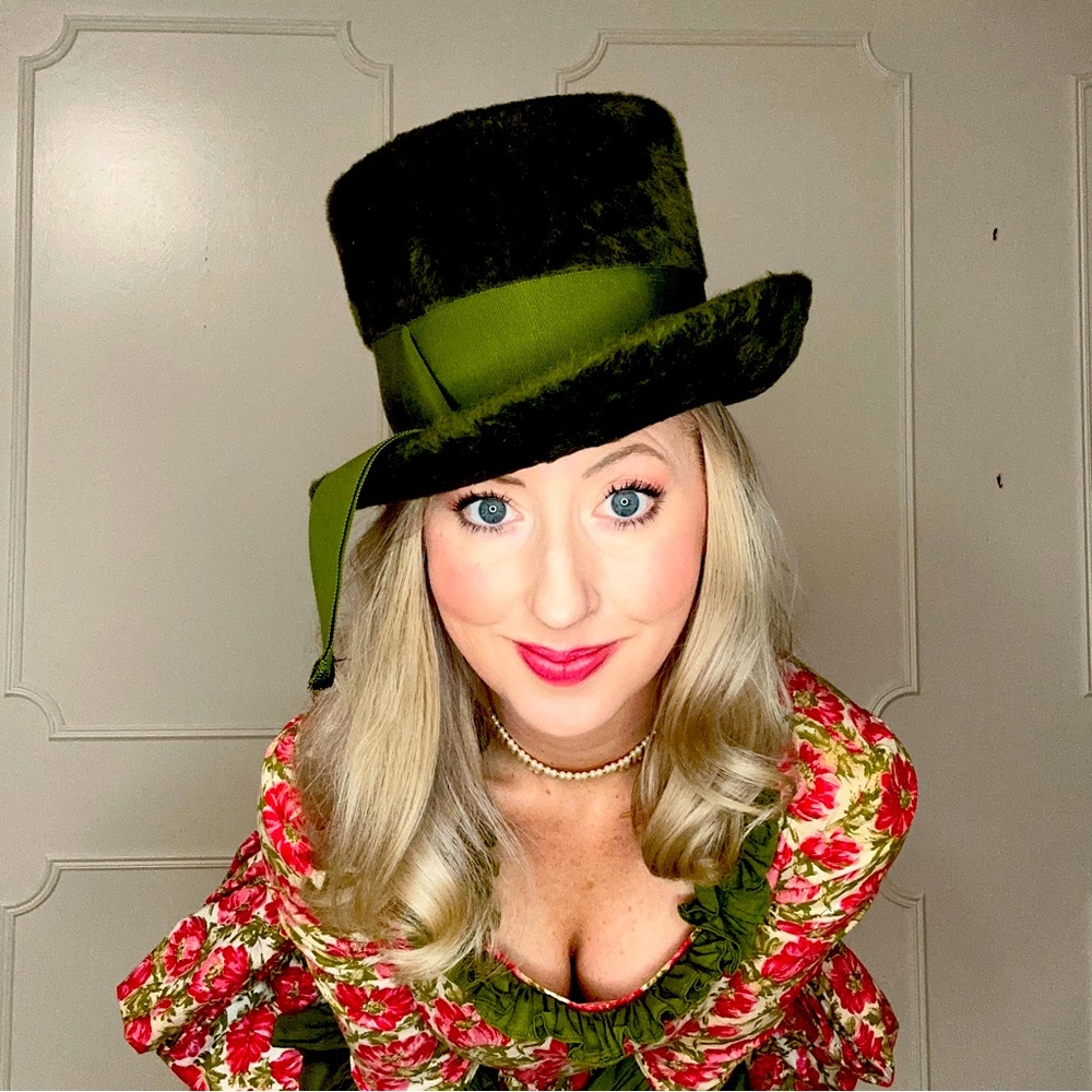 1960s furry green top hat in a rich love green